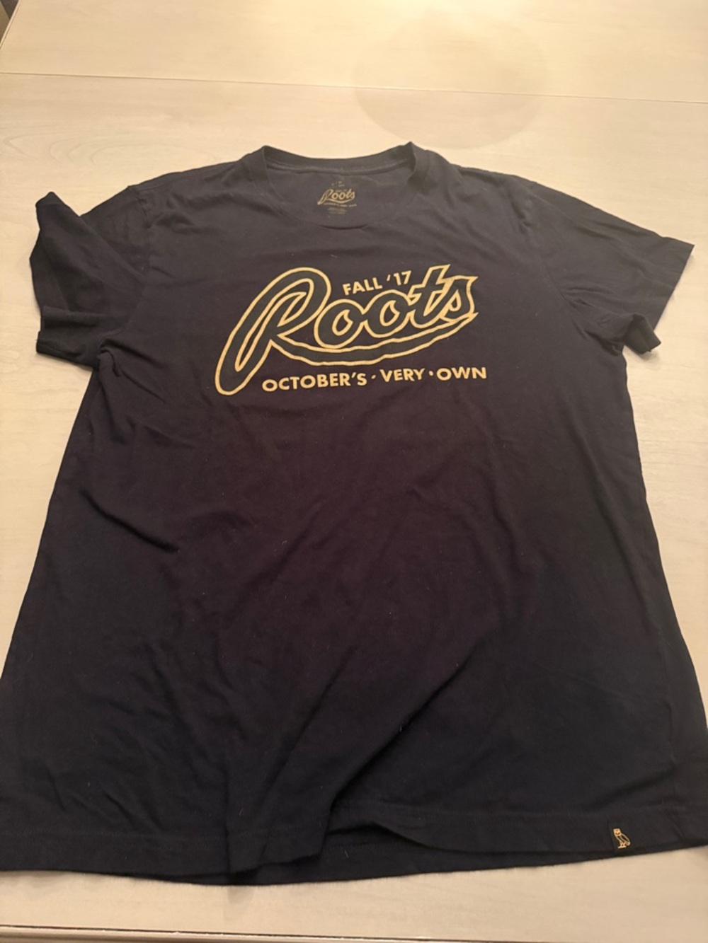 Roots x OVO collab Black Tee with Gold Script Logo